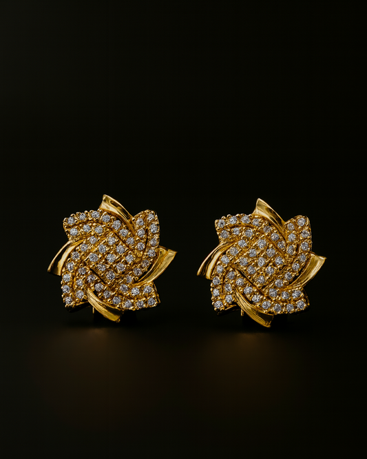 Golden Bloom Diamond-Accent Stud Earrings – Luxury Floral Twist Design