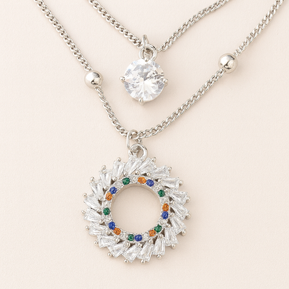 Silver-Plated Layered Pendant Necklace with Crystal & Multicolor Wreath Charm – Elegant Double Chain Design