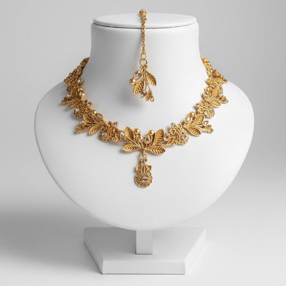 Gold-Plated Necklace, Earrings & Maang Tikka Set – Leaf Design with Stone Detailing and Elegant Finish