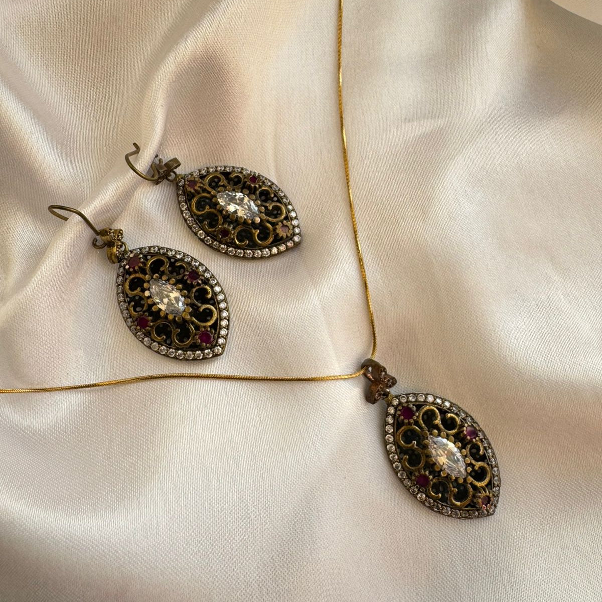 Elegant Antique Gold Bronze Oval Stone Filigree Pendant  Set  with Ruby Accents