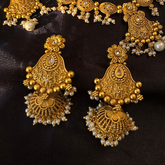 Antique Gold Plated Traditional Matte Finish Jewelry Set with Jhumka Earrings and Maang Tikka