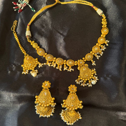 Antique Gold Plated Traditional Matte Finish Jewelry Set with Jhumka Earrings and Maang Tikka