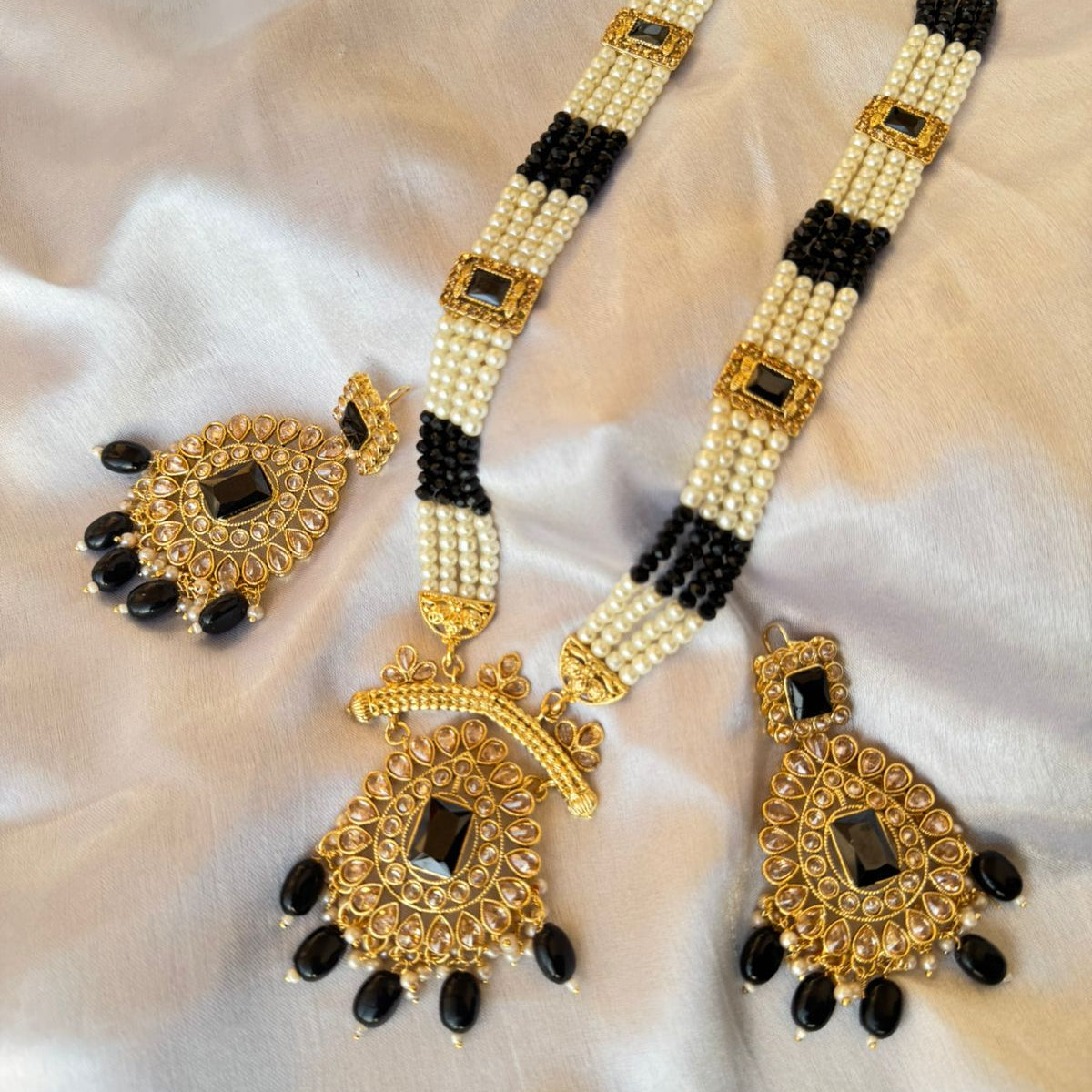 Regal Gold-Plated Kundan Pink & Black Variants Bead Long Necklace Set