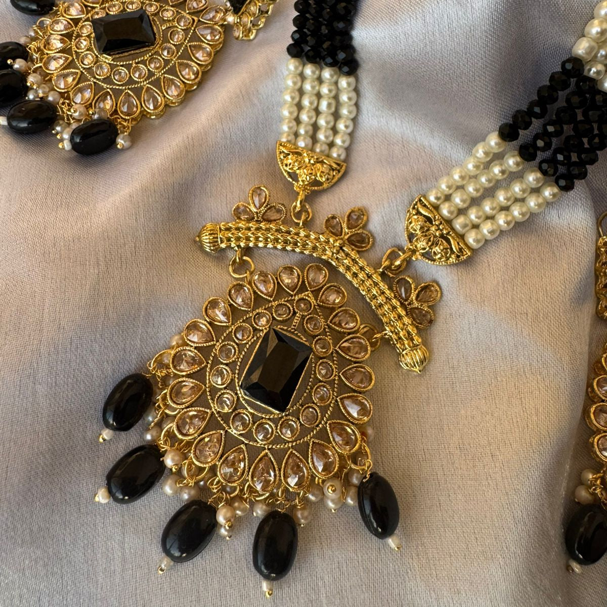 Regal Gold-Plated Kundan Pink & Black Variants Bead Long Necklace Set